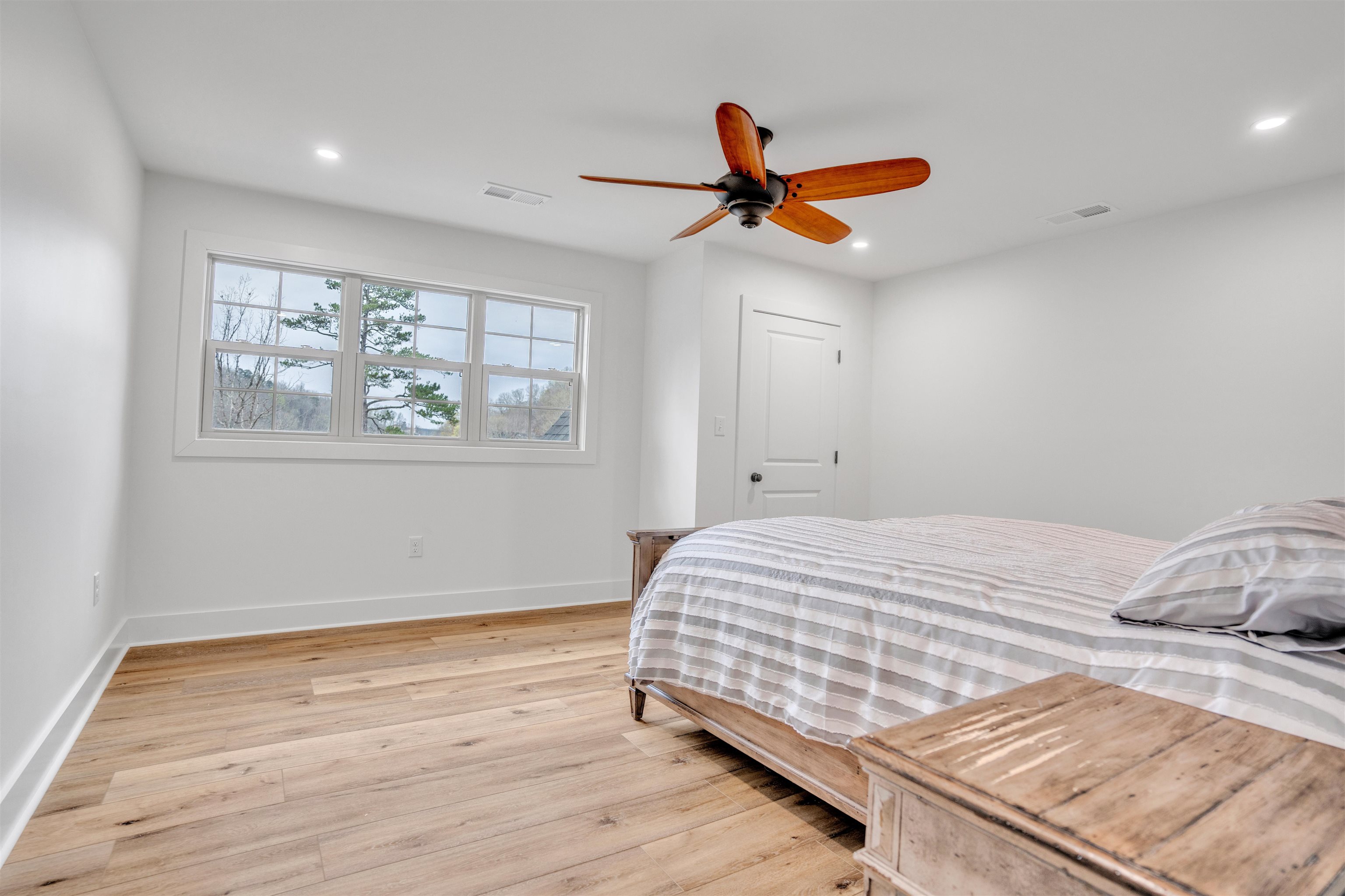 70 Native Leaf Cove Savannah, TN 38372 - Photo 22 of 40 a bedroom with a bed and a window