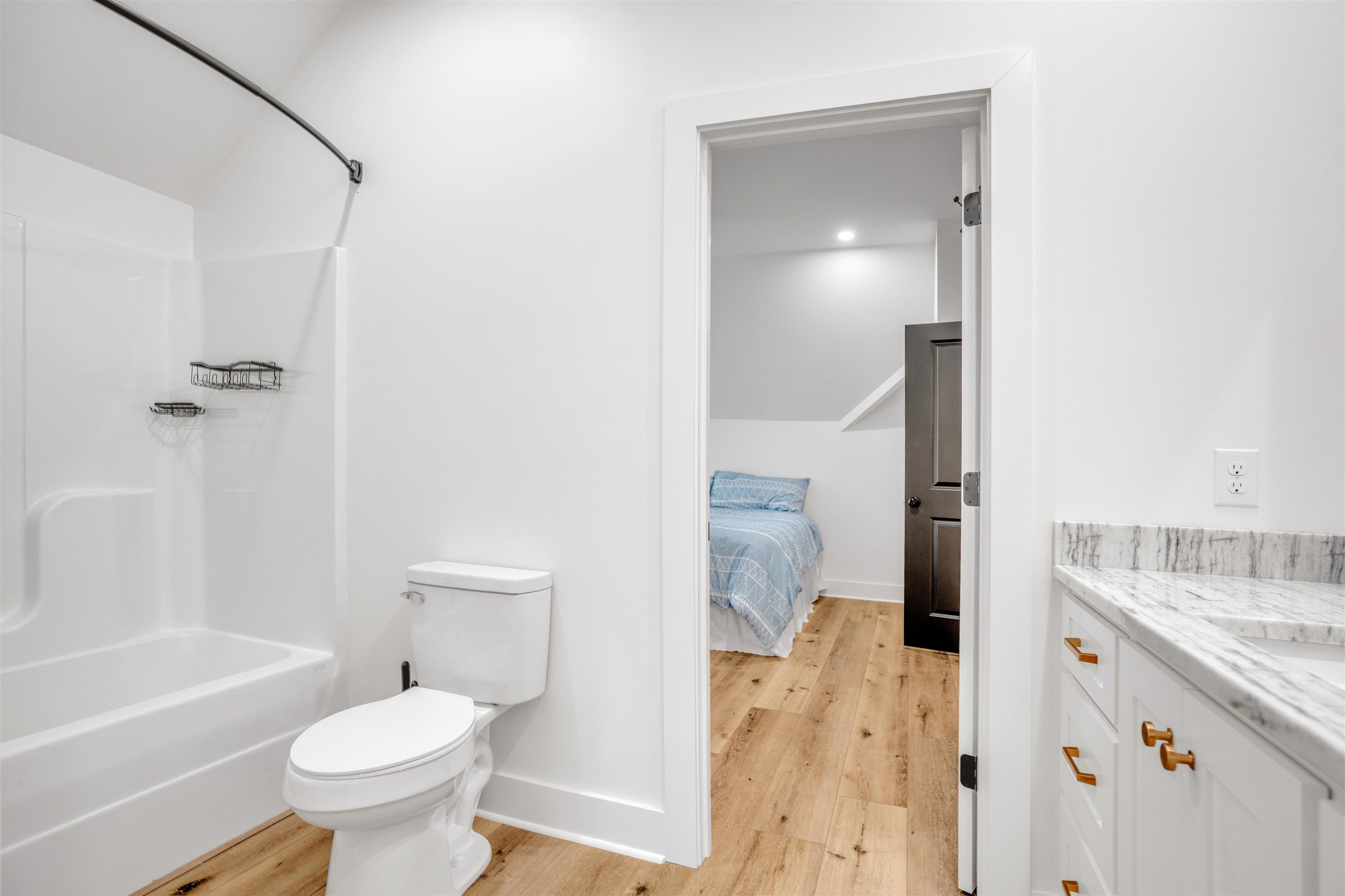 70 Native Leaf Cove Savannah, TN 38372 - Photo 27 of 40 a bathroom with a granite countertop sink toilet and shower
