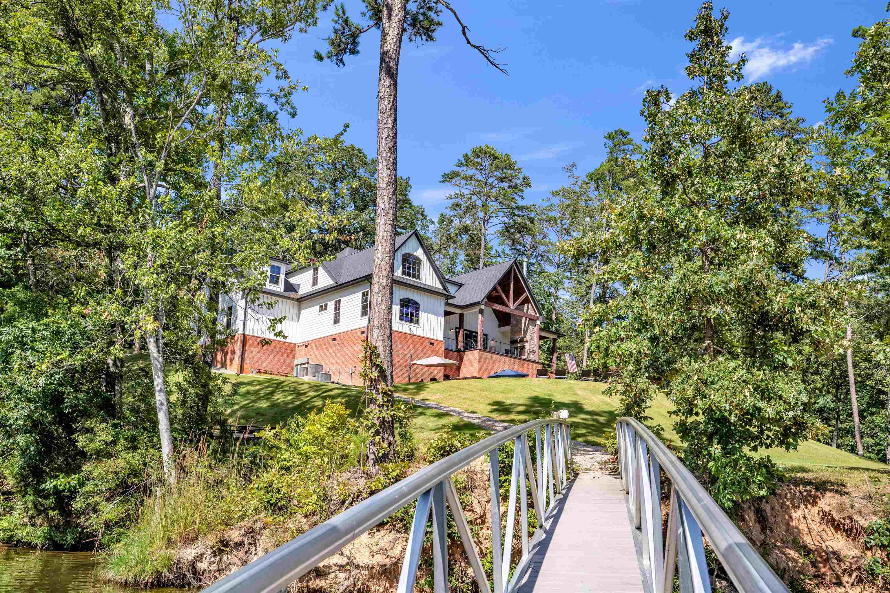 70 Native Leaf Cove Savannah, TN 38372 - Photo 37 of 40 a balcony with tall trees in front of it