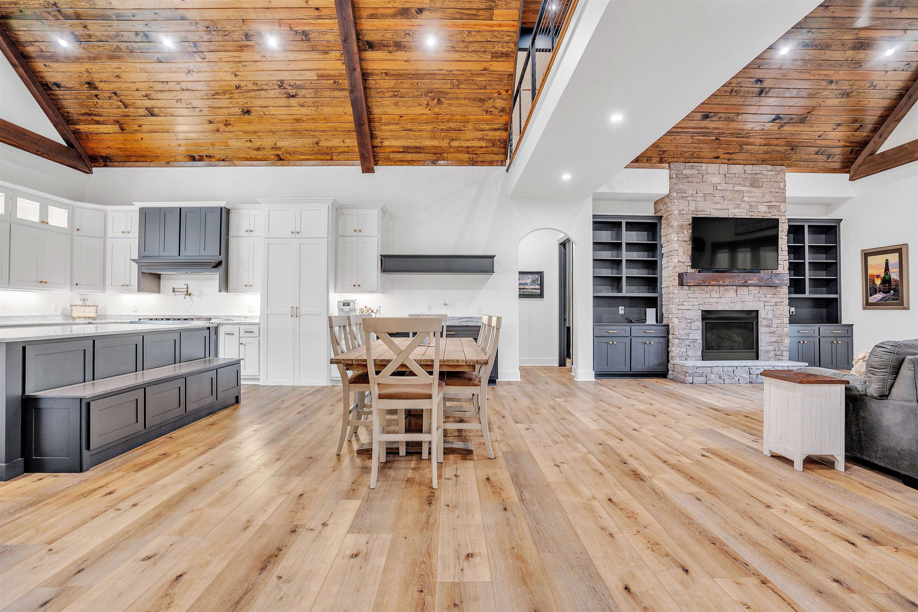 70 Native Leaf Cove Savannah, TN 38372 - Photo 5 of 40 a living room with stainless steel appliances furniture wooden floor and a kitchen view