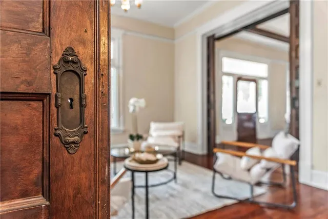 a kitchen with stainless steel appliances granite countertop a sink a stove and a counter space