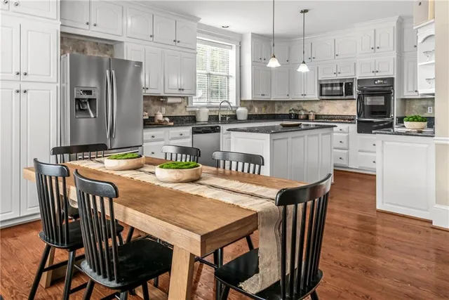 a bedroom with a bed and a fireplace