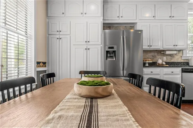 a bathroom with a sink toilet and mirror