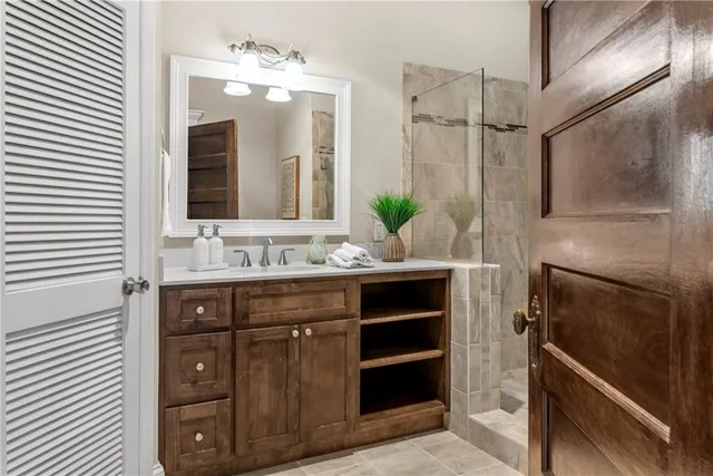 a spacious bathroom with a bathtub and a shower