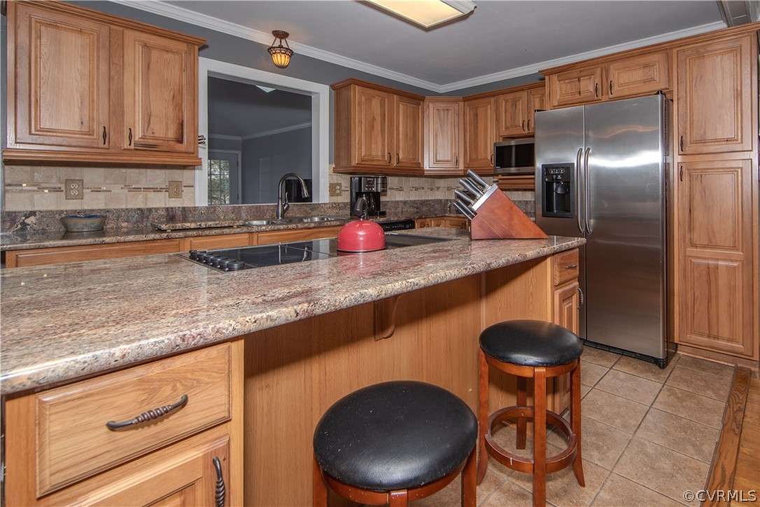 13717 Winterberry Ridge Midlothian, VA 23112 - Photo 8 of 29 a kitchen with stainless steel appliances granite countertop a sink refrigerator and cabinets