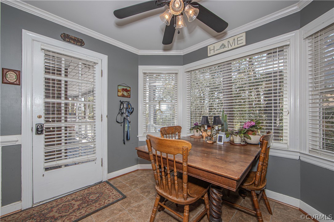 13717 Winterberry Ridge Midlothian, VA 23112 - Photo 9 of 29 a view of a dining room with furniture window and outside view