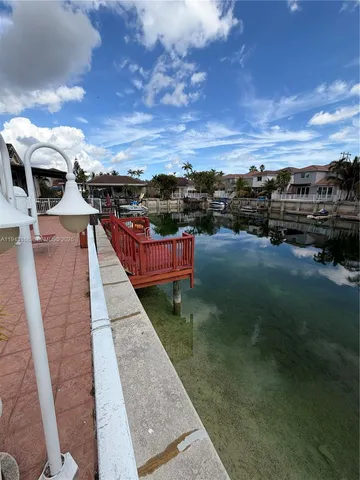 a view of outdoor space and swimming pool