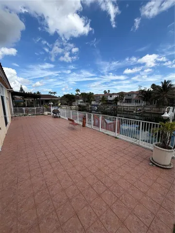 a terrace with a city view