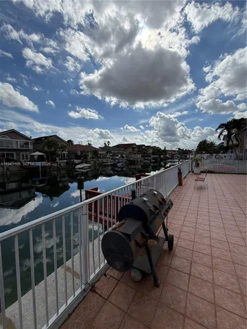 a view of a backyard of the house
