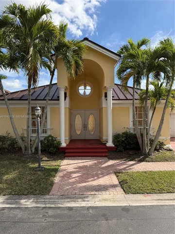 a front view of a house having yard