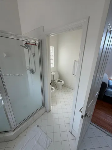 a living room with hard wood floor