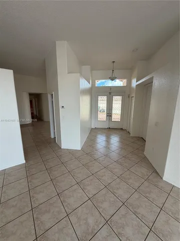 a view of a hallway with workspace