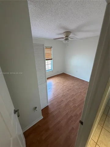 a kitchen with a sink and appliances