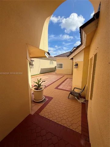 a front view of a house with yard