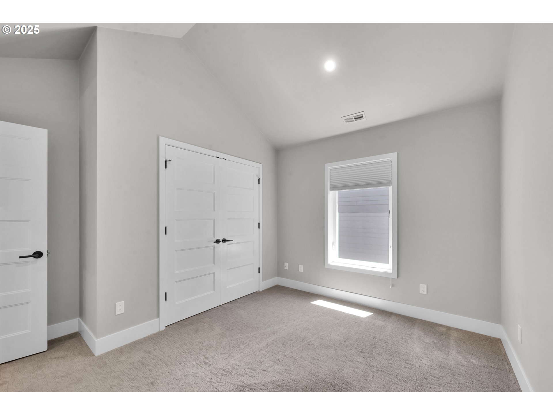 1915 Elkhorn Drive Eugene, OR 97408 - Photo 22 of 28 a view of an empty room with a window