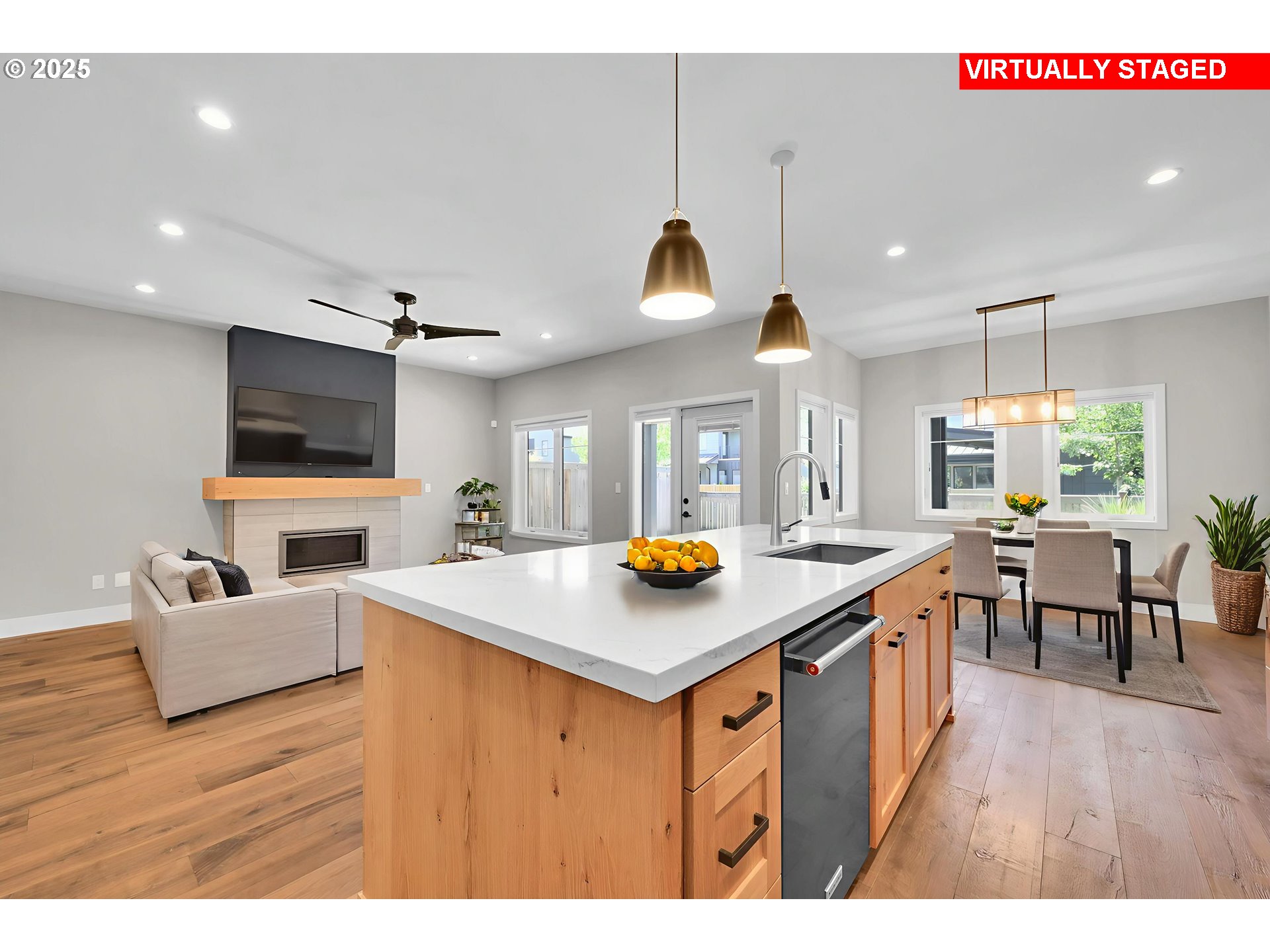 1915 Elkhorn Drive Eugene, OR 97408 - Photo 5 of 28 a kitchen with a stove a counter space a sink and living room view