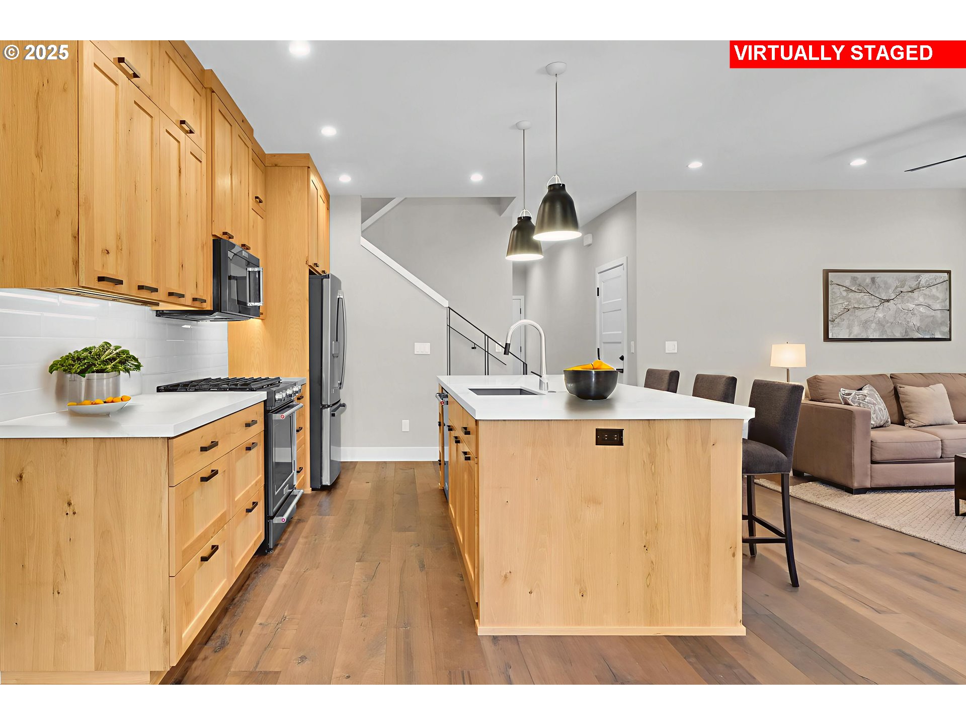 1915 Elkhorn Drive Eugene, OR 97408 - Photo 7 of 28 a large white kitchen with a large counter top appliances and cabinets