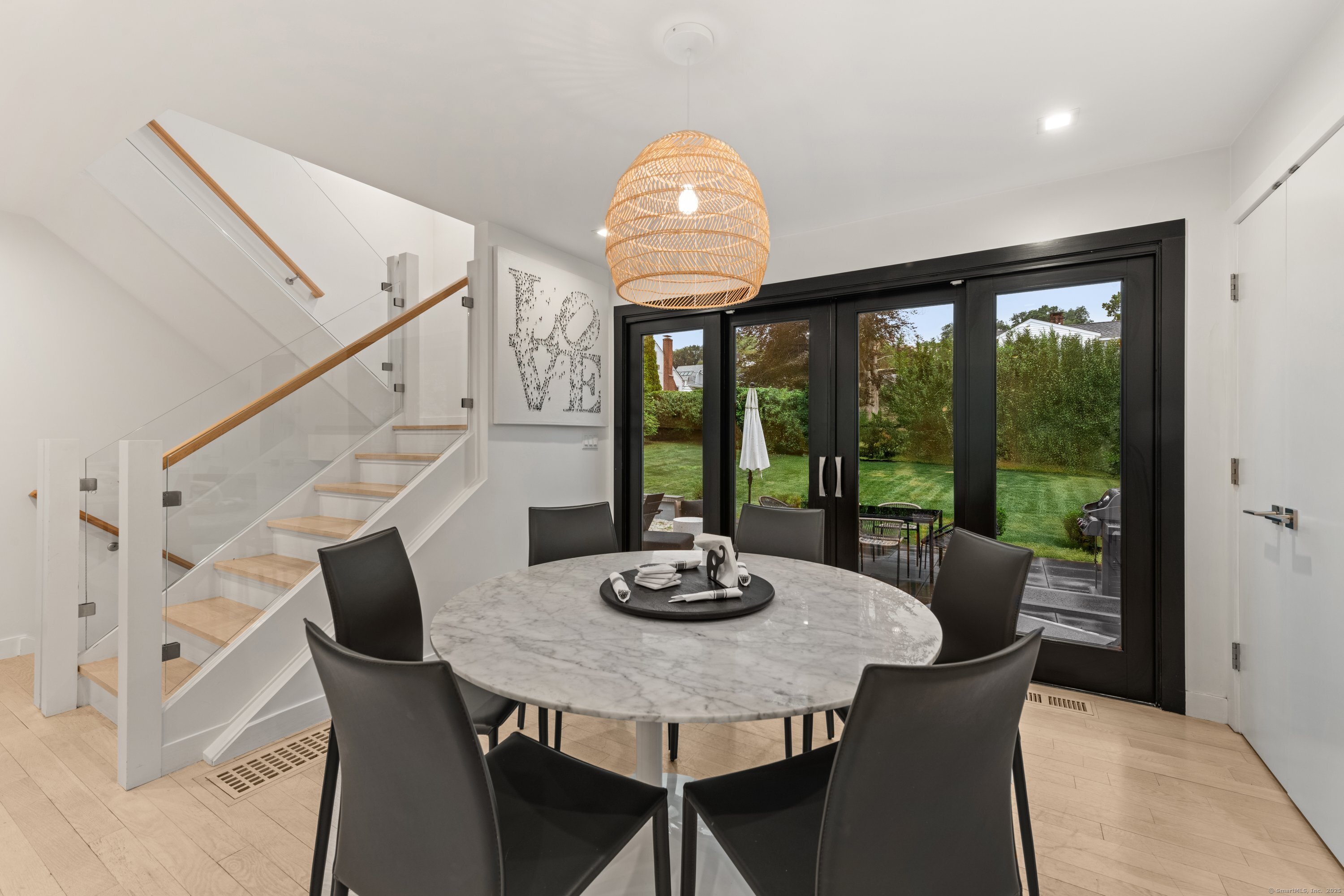 200 Hillspoint Road Westport, CT 06880 - Photo 17 of 37 a view of a dining room with furniture window and outside view