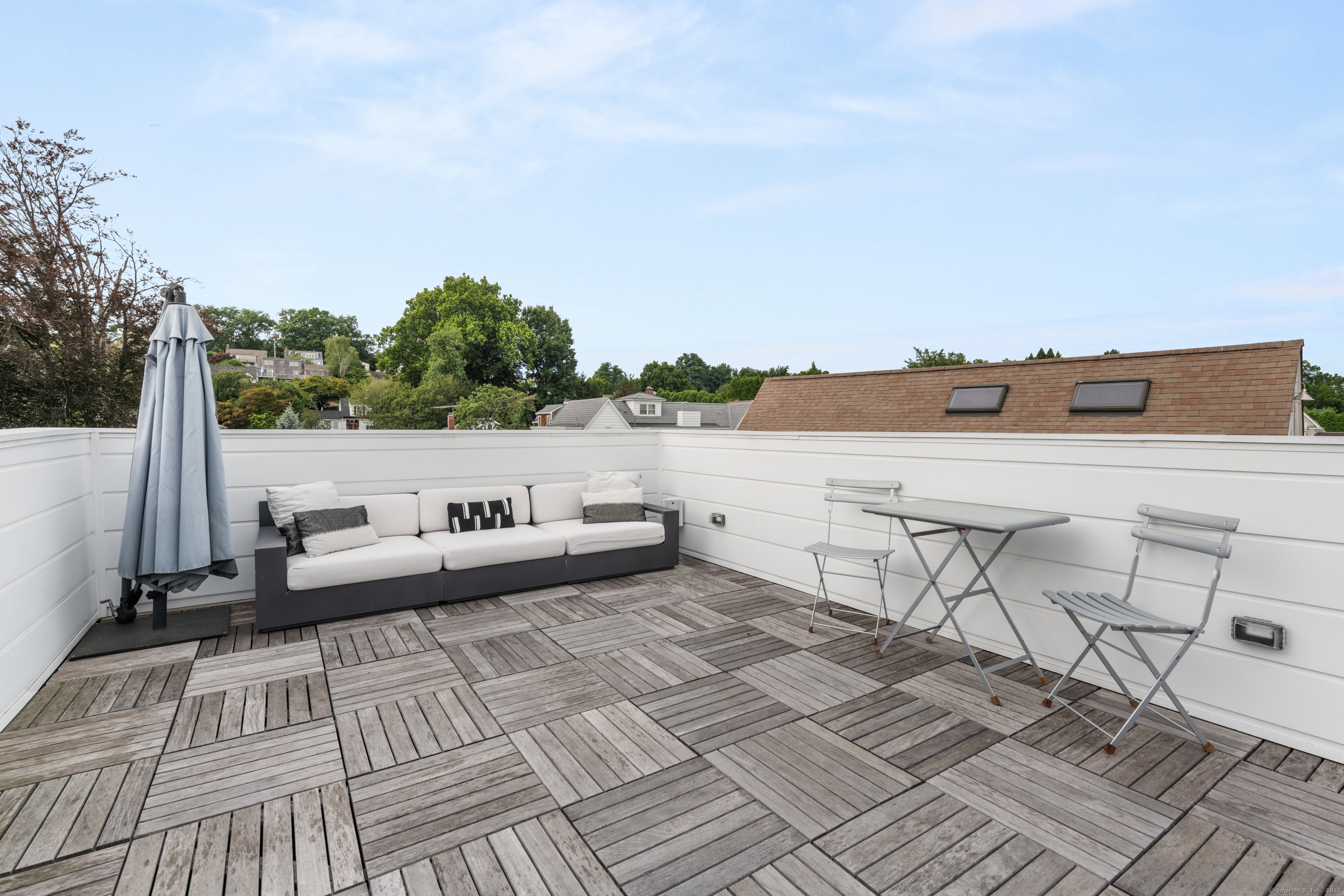 200 Hillspoint Road Westport, CT 06880 - Photo 30 of 37 a view of terrace with lawn chairs and mountain view