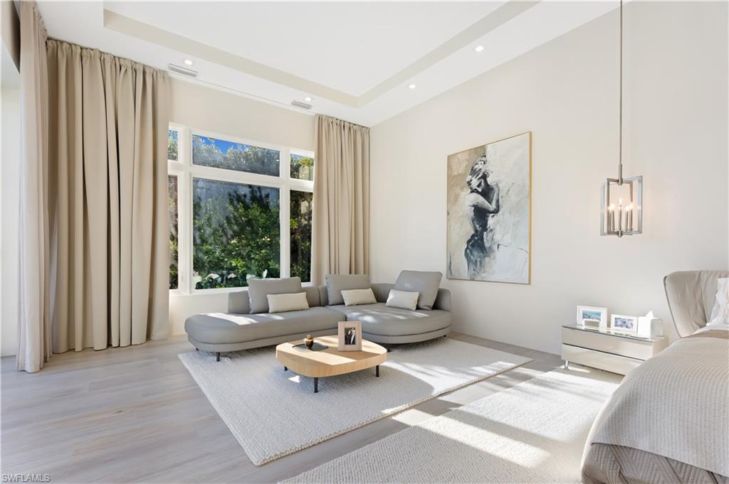 2485 Crayton Road Naples, FL 34103 - Photo 11 of 33 Sitting Area in Primary bedroom