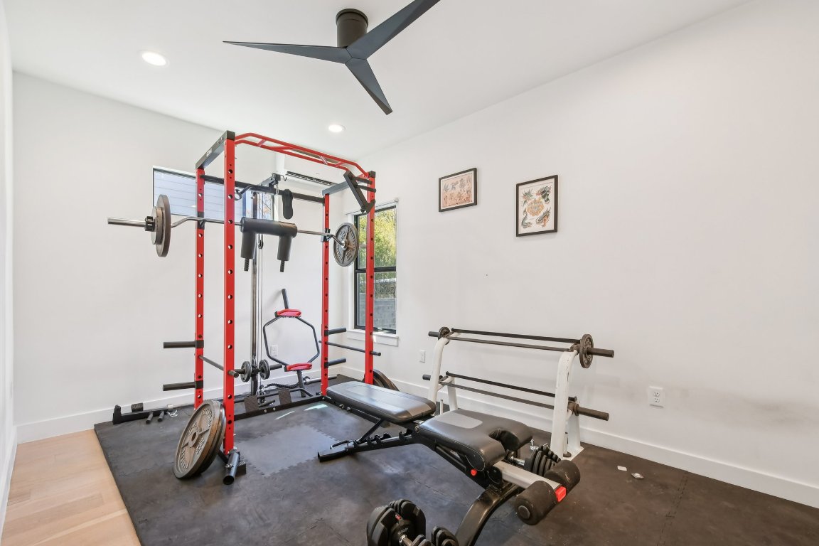 2916 East 13th Street, Unit 2 Austin, TX 78702 - Photo 22 of 35 Workout area featuring recessed lighting and ceiling fan