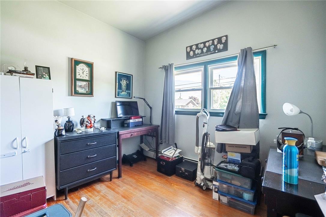 579 Cherry Road Northampton, PA 18067 - Photo 35 of 57 Hardwood floors and generous windows create a naturally lit and functional bedroom space.