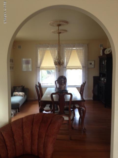 507 Ballard Road Zillah, WA 98953 - Photo 11 of 11 a living room with furniture and a large window