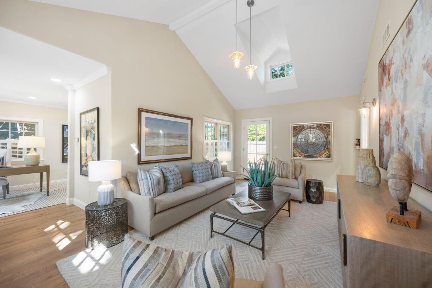 445 Arlington Road Redwood City, CA 94062 - Photo 34 of 50 a living room with furniture and a chandelier