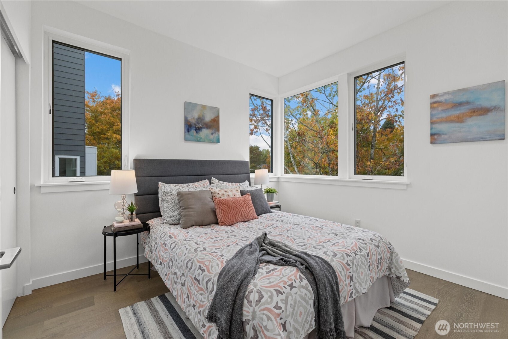 2009 South Norman Street, Unit B Seattle, WA 98144 - Photo 19 of 27 a bedroom with a bed and a painting on the wall
