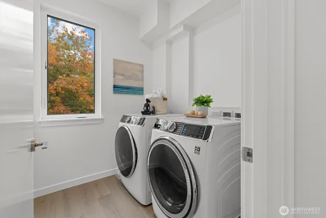 a utility room with dryer and washer