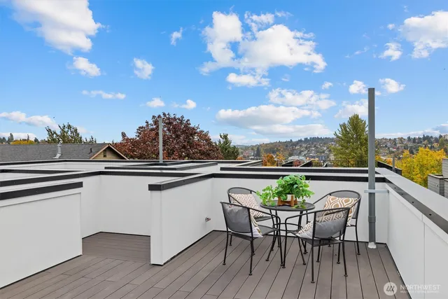 a view of balcony with furniture
