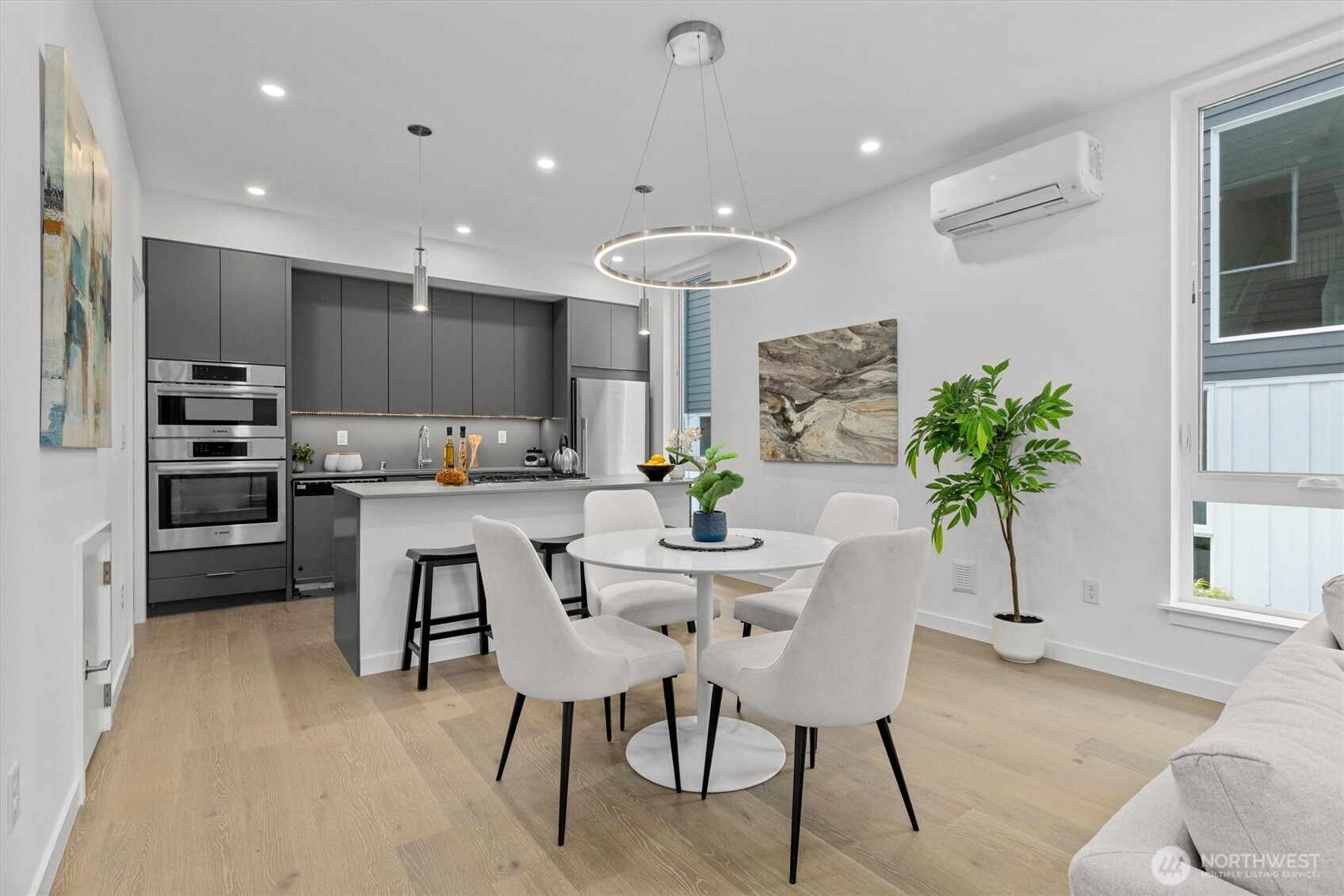 2009 South Norman Street, Unit B Seattle, WA 98144 - Photo 8 of 27 a dining room with furniture and a potted plant