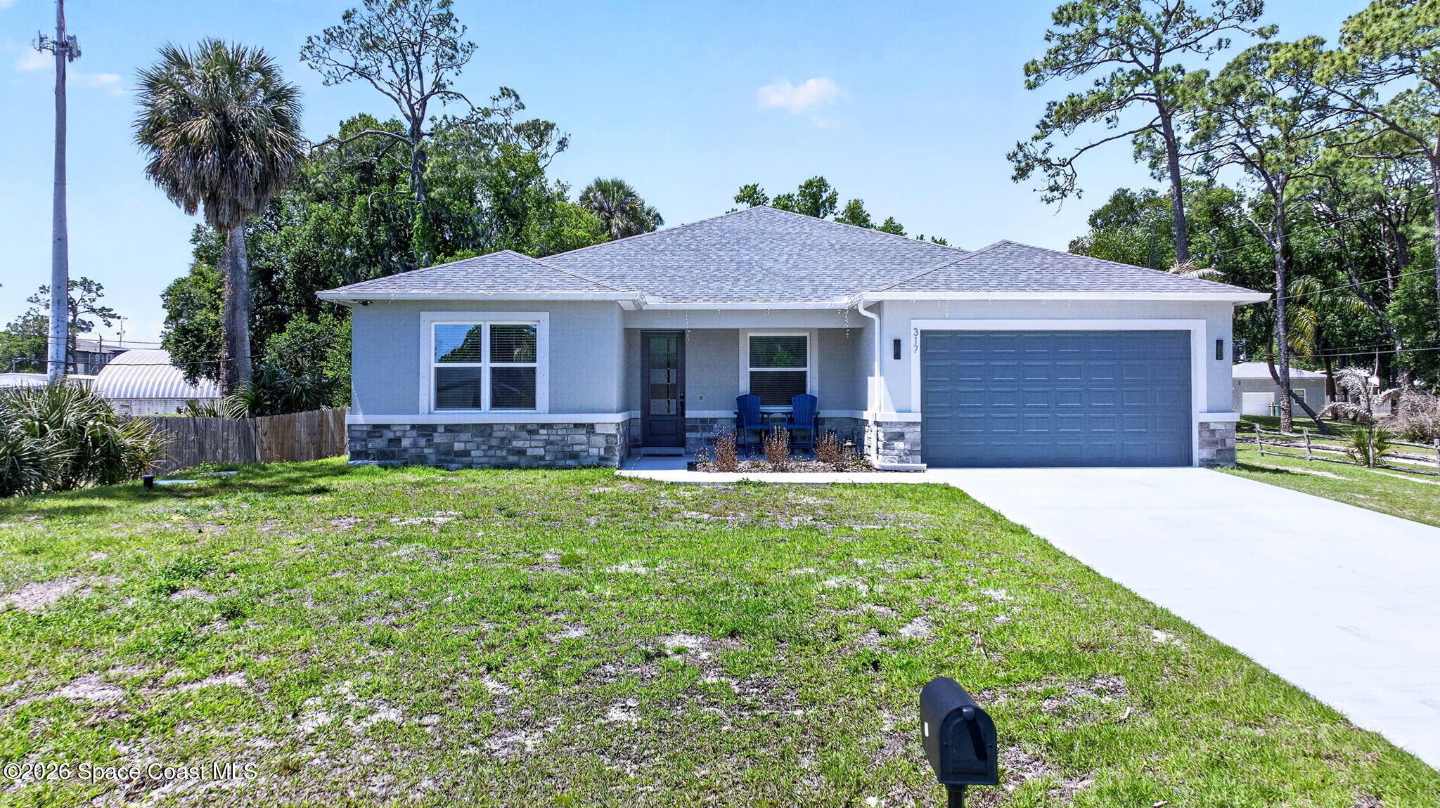 317 Northwest Valencia Road Melbourne, FL 32904 - Photo 2 of 47 DJI_20260416134927_0003_D