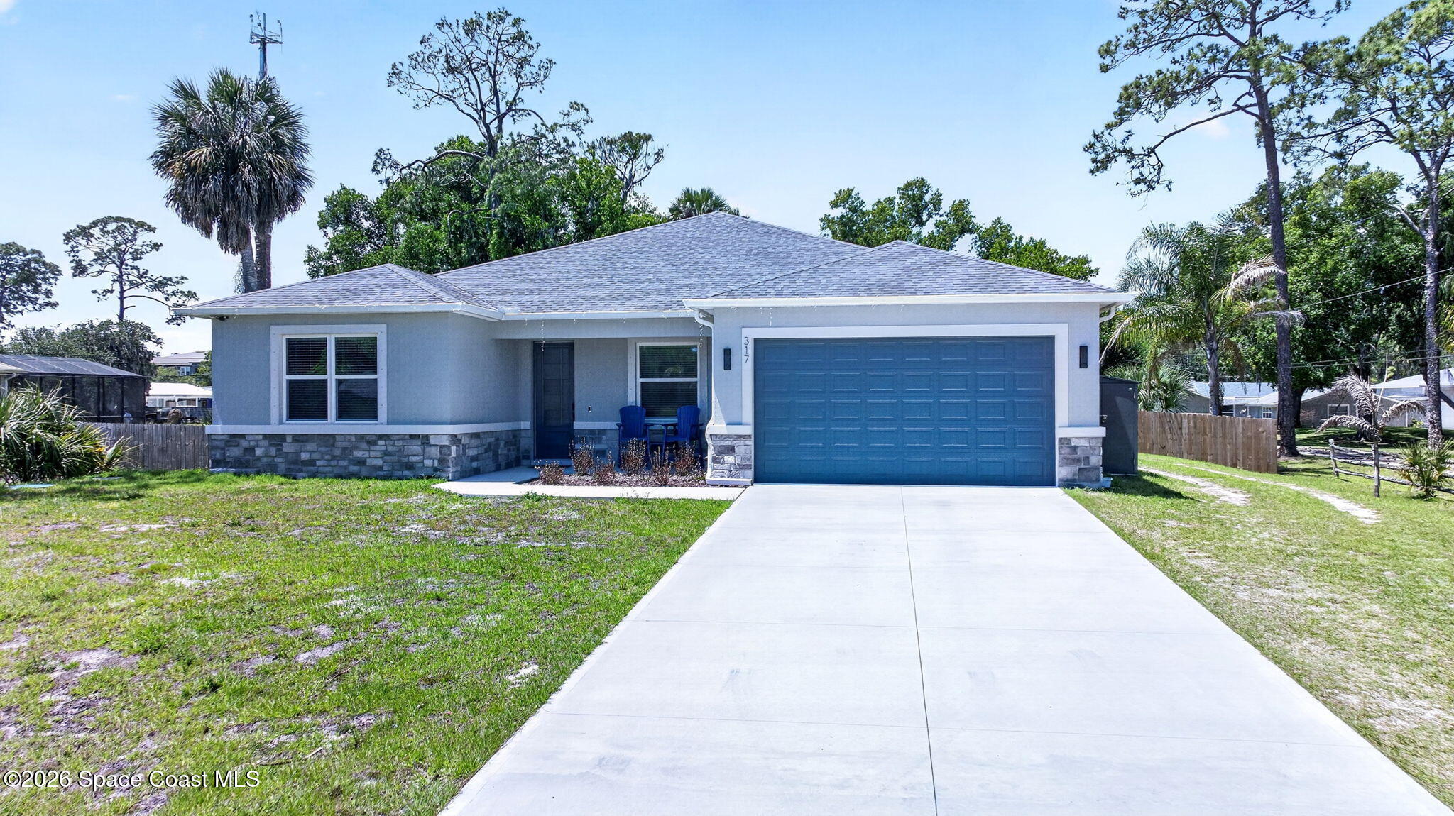317 Northwest Valencia Road Melbourne, FL 32904 - Photo 3 of 47 DJI_20260416134941_0004_D