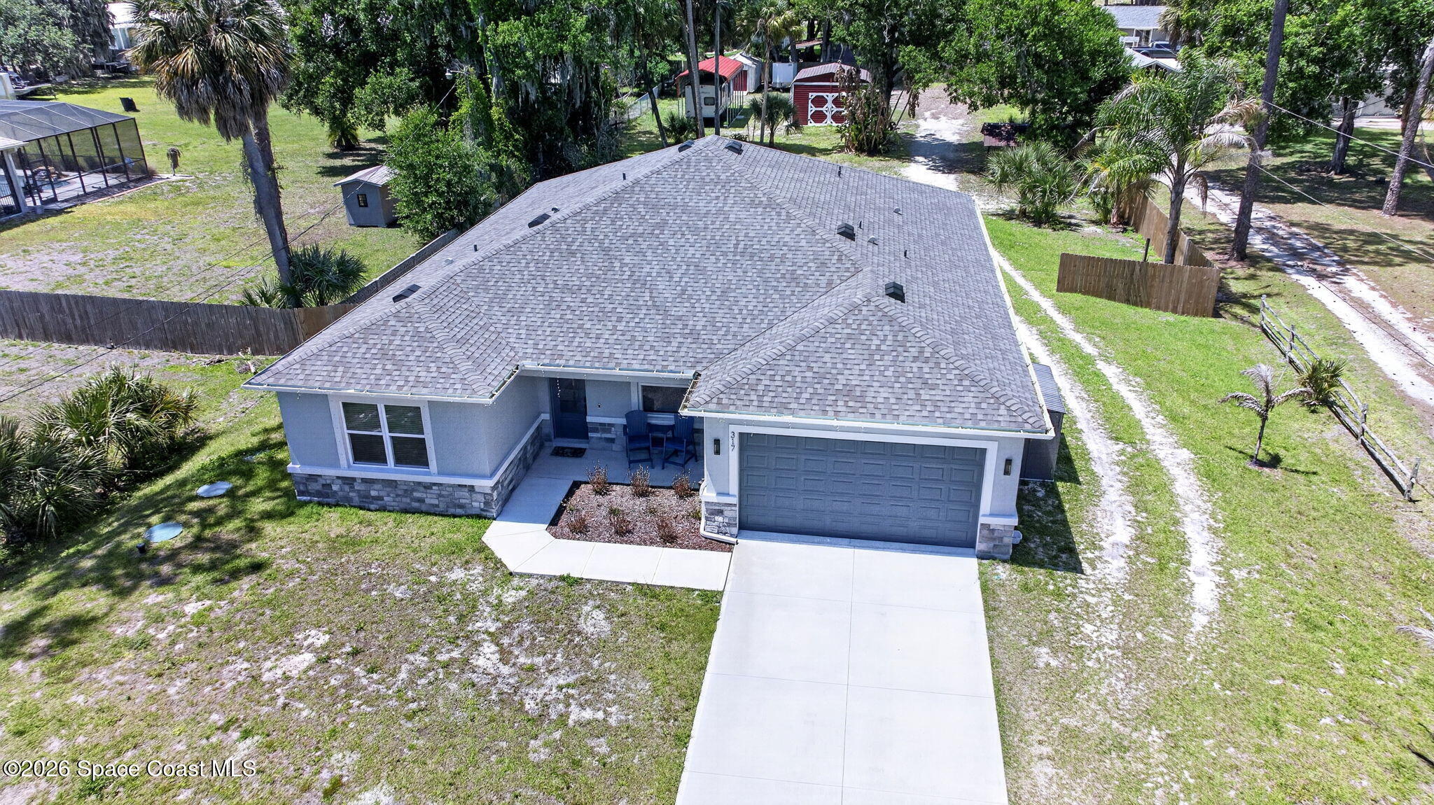 317 Northwest Valencia Road Melbourne, FL 32904 - Photo 38 of 47 DJI_20260416134950_0005_D