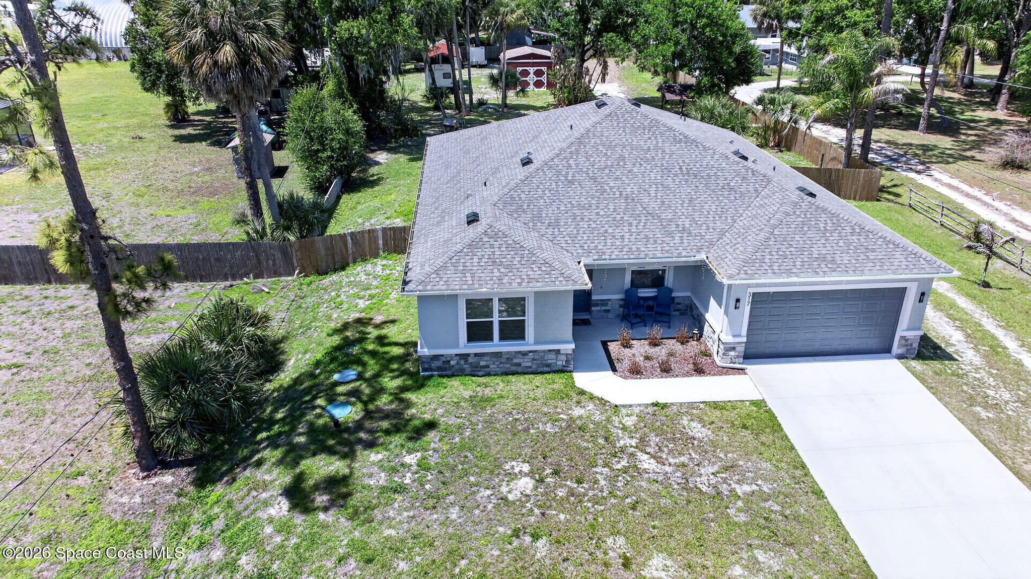 317 Northwest Valencia Road Melbourne, FL 32904 - Photo 39 of 47 DJI_20260416134958_0006_D