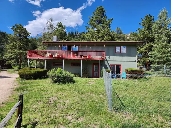 a view of house with outdoor space