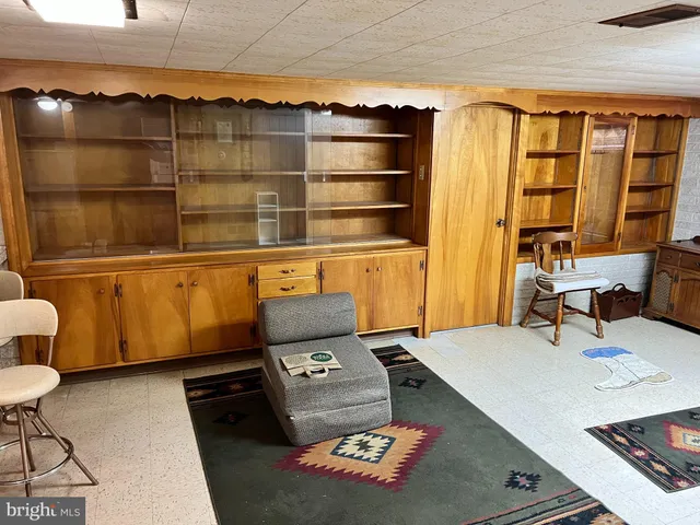a view of a workspace with furniture