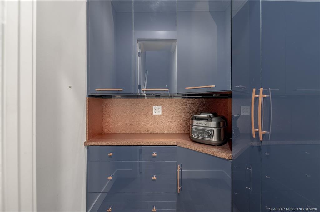 411 Southeast High School Avenue Stuart, FL 34994 - Photo 24 of 37 a view of storage and utility room