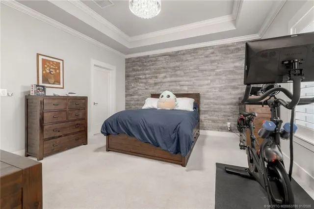 a bedroom with a bed and furniture
