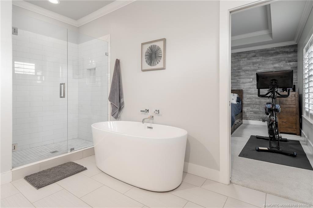 411 Southeast High School Avenue Stuart, FL 34994 - Photo 8 of 37 a bathroom with a sink and a mirror