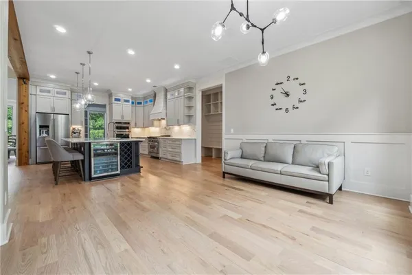a bathroom with a granite countertop sink mirror and toilet