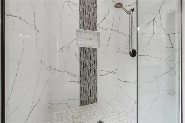 a bathroom with a double vanity sink and a bathtub