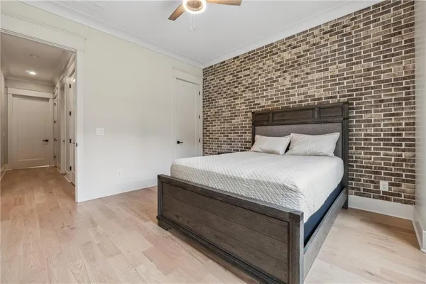 a white bath tub sitting next to a white sink