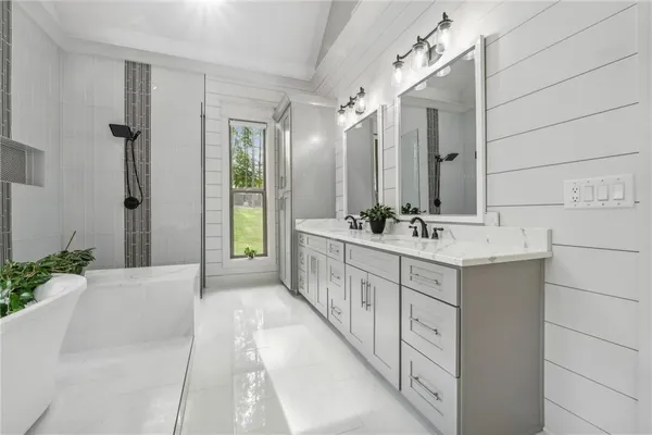 a view of room with window and wooden floor