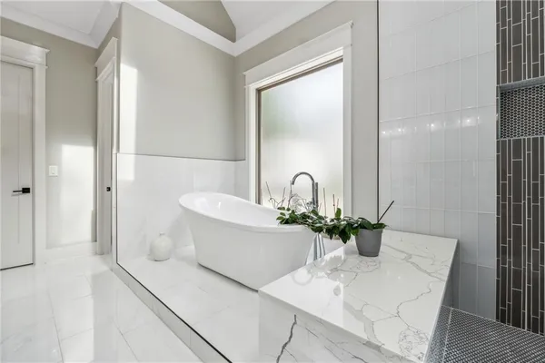 a view of a porch with furniture and a fireplace