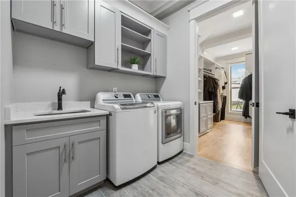 an aerial view of a swimming pool with a yard