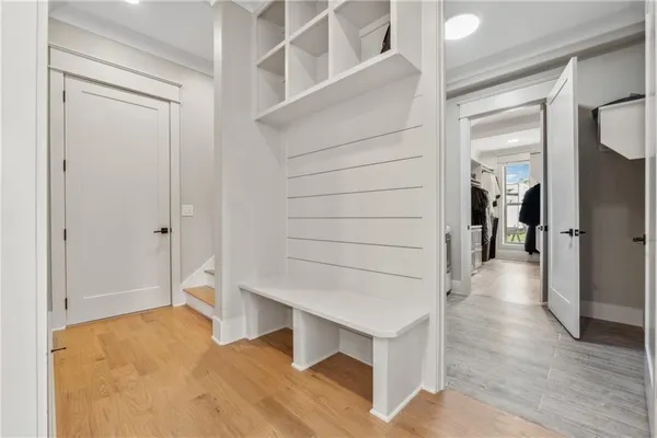 an aerial view of residential house with an outdoor space and seating