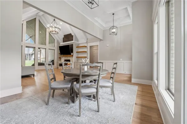 a view of a livingroom with furniture window and wooden floor