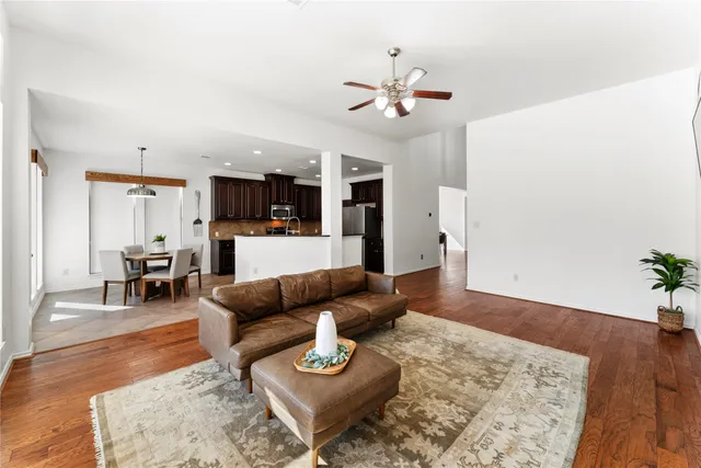 a view of a table and chairs under an umbrella
